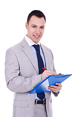 Image showing Business man signing papers