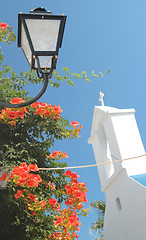 Image showing lamp, church, flowers