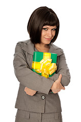 Image showing green box with yellow bow as a gift