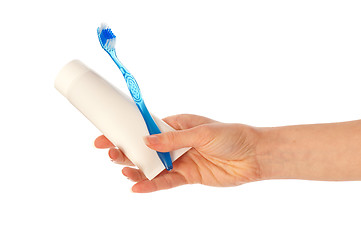 Image showing Toothpaste and blue toothbrush