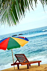 Image showing umbrella and lounge chair on the exotic island