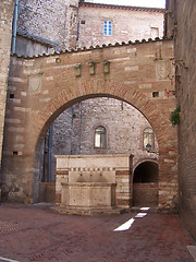 Image showing Mediaeval fountain and archway