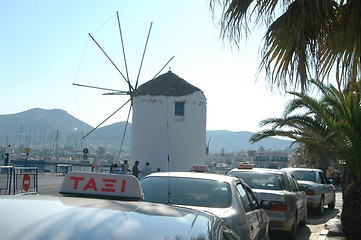 Image showing windmill and taxis