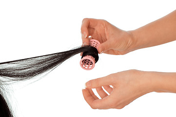 Image showing hairdresser makes curls