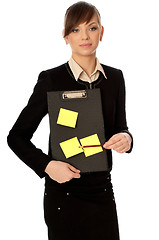 Image showing officer with document case and stickers