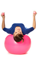 Image showing Exercises with dumbbells on a gymnastic ball