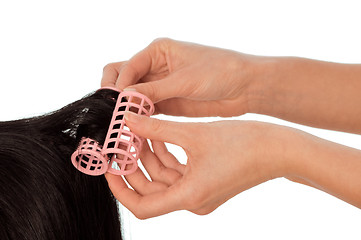 Image showing hairdresser makes curls