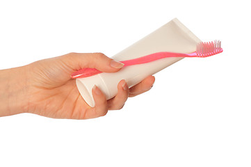 Image showing Toothpaste and pink toothbrush