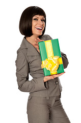 Image showing green box with yellow bow as a gift