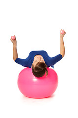 Image showing Exercises with dumbbells on a gymnastic ball