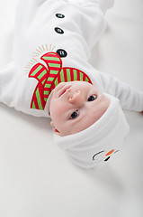 Image showing Baby boy in snowman costume watching on you