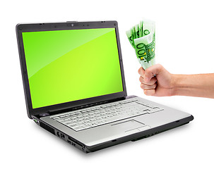 Image showing Laptop and money