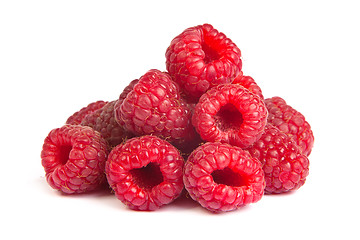 Image showing Group of some raspberries on a white background. Close up macro 