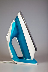 Image showing Blue electric iron