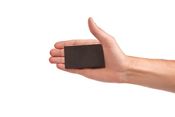 Image showing Businessman's hand holding blank business card