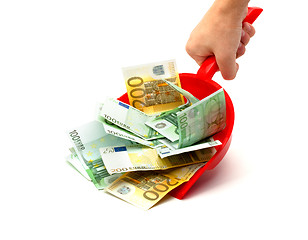 Image showing hand, dustpan, money