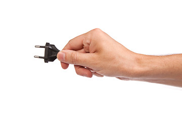 Image showing Man is holding a black outlet in the hand