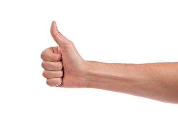 Image showing Male hand showing thumbs up sign isolated on white