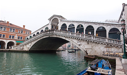 Image showing Venice Grand canal with gondolas and Rialto Bridge