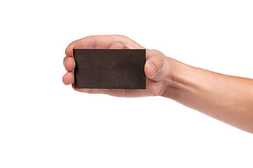 Image showing Businessman's hand holding blank business card