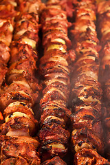 Image showing Steak and other meat on barbeque. Background