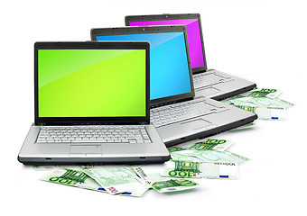 Image showing Open laptop with money 