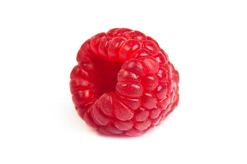 Image showing Single fresh raspberry, isolated on  white. Close up macro shot