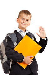 Image showing Schoolboy with orange book