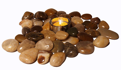 Image showing Candle and pebbles