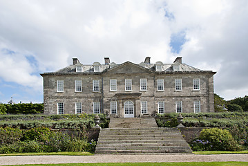 Image showing English Country House and Flowerbeds