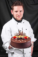 Image showing Confectioner and a cake