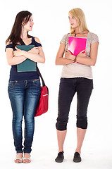 Image showing Two beautiful student girls getting ready for school