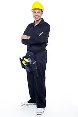 Image showing Repairman with tools pouch around his waist