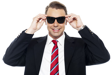 Image showing Stylish handsome businessman wearing shades