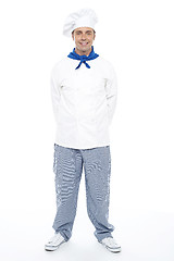 Image showing Smart young smiling male chef posing casually