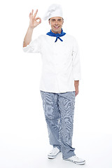 Image showing Full length portrait of chef showing okay sign