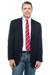 Image showing Smiling young businessperson posing casually