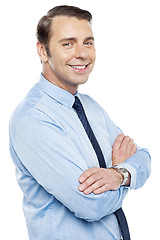 Image showing Handsome representative posing with folded arms