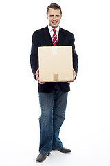 Image showing Business representative holding cardboard box