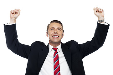 Image showing Successful corporate male, arms raised