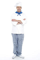 Image showing Young chef posing with his arms crossed