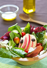 Image showing Apple with raisin and spinach salad