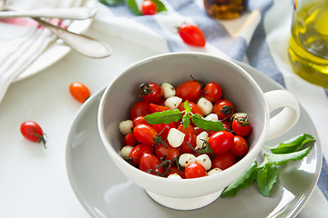 Image showing Cherry tomato with pearl mozzarella salad