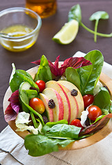 Image showing Apple with raisin and spinach salad