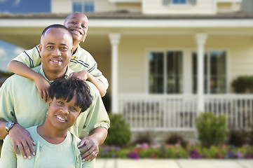 Image showing Attractive African American Family in Front of Home