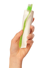 Image showing Toothpaste and green toothbrush