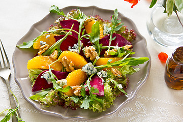 Image showing Orange with Beetroot and rocket salad