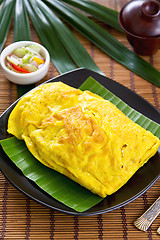 Image showing Stir fried vegetables and coconut wrapped in omelet [Thai's food]