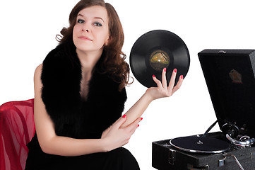 Image showing Pretty woman with gramophone