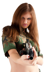 Image showing Pretty woman with a gun